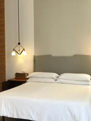 Letto o letti in una camera di Room 55
