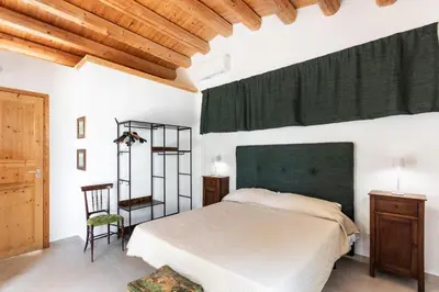 Letto o letti in una camera di Agriturismo Val Di Noto