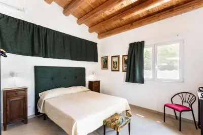 Letto o letti in una camera di Agriturismo Val Di Noto