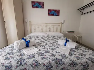 Letto o letti in una camera di Villa Midolo