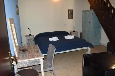 Letto o letti in una camera di Agriturismo Il Ranch