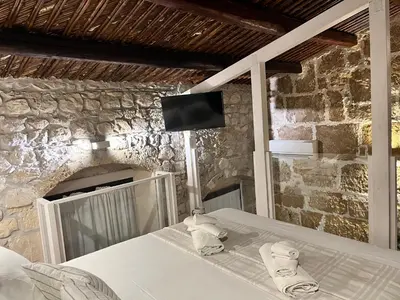 Letto o letti in una camera di Nonna Ninetta “TipicalSicilianHouse”