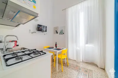 Cucina o angolo cottura di LE 4 PERLE Apartments