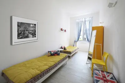 Letto o letti in una camera di AGATOCLEY, ai piedi di Ortigia