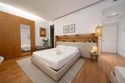 Letto o letti in una camera di Nerello Suites and Rooms