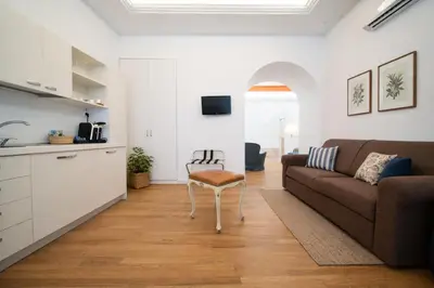 TV o dispositivi per l'intrattenimento presso Nerello Suites and Rooms