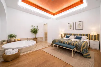 Letto o letti in una camera di Nerello Suites and Rooms