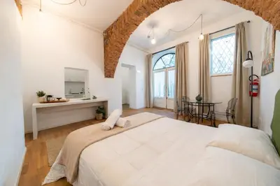 Letto o letti in una camera di Nerello Suites and Rooms