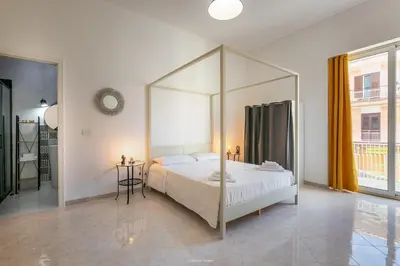 Letto o letti in una camera di ONIRO