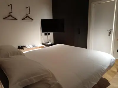 Letto o letti in una camera di Palazzo Salomone