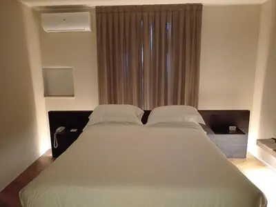 Letto o letti in una camera di Palazzo Salomone