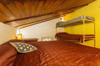 Letto o letti in una camera di La Dimora di via Manzoni