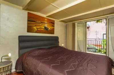 Letto o letti in una camera di La Dimora di via Manzoni