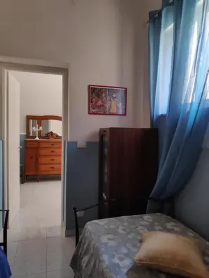 Letto o letti in una camera di casa G&G