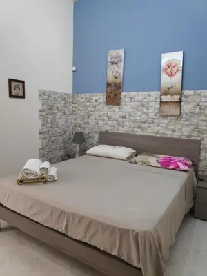 Letto o letti in una camera di casa G&G