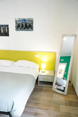 Letto o letti in una camera di alex rooms