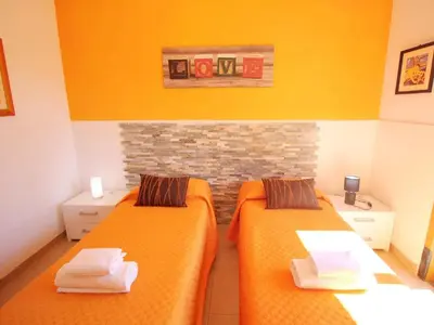 Letto o letti in una camera di Viila near Syracuse in Siracusa