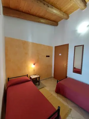 Letto o letti in una camera di Cloris Guest House