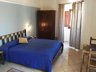 Letto o letti in una camera di Cloris Guest House