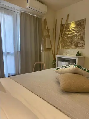 Letto o letti in una camera di La Volta Rooms Locazione turistica