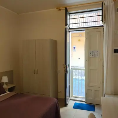 Letto o letti in una camera di Bella Giulia