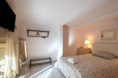 Letto o letti in una camera di Cozy's house nel cuore della città