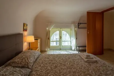 Letto o letti in una camera di Cozy's house nel cuore della città