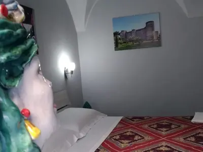 Letto o letti in una camera di Tourist House La Castellana