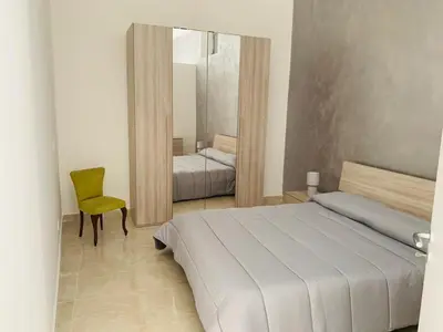 Letto o letti in una camera di Casa Vacanze San Nicolò