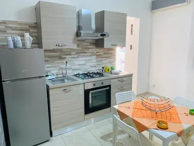 Cucina o angolo cottura di Casa Vacanze San Nicolò