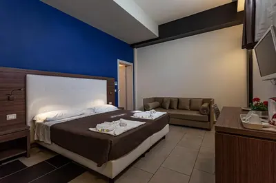 Letto o letti in una camera di Hotel Don Giovanni