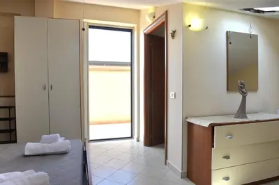 Letto o letti in una camera di Marzamemi