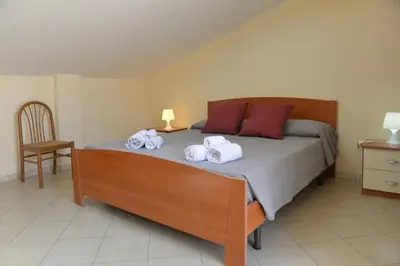 Letto o letti in una camera di Marzamemi