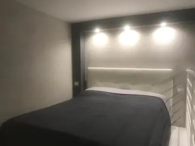Letto o letti in una camera di CASA VERGINELLE SHORT LETS