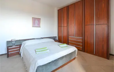 Letto o letti in una camera di Bellavista