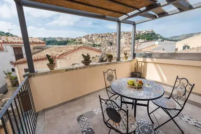 Balcone o terrazza di Il Baiocco -Ibla Charme Rooms