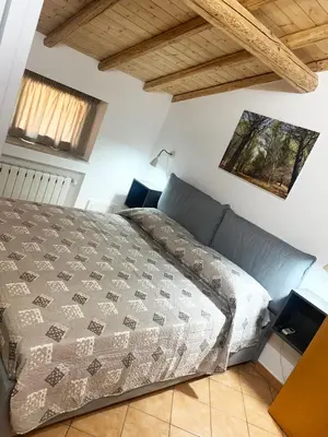 Letto o letti in una camera di Rooms Teatro Greco