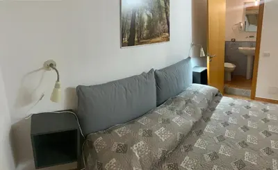 Letto o letti in una camera di Rooms Teatro Greco