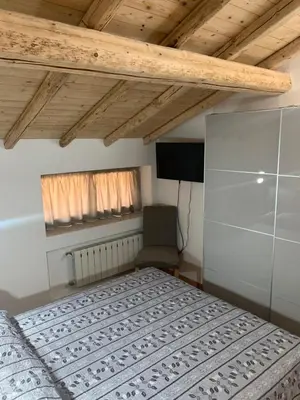 Letto o letti in una camera di Rooms Teatro Greco