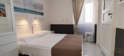 Letto o letti in una camera di DUCEZIO rooms