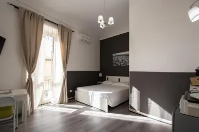 Letto o letti in una camera di DUCEZIO rooms
