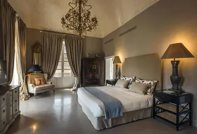 Letto o letti in una camera di Seven Rooms Villadorata