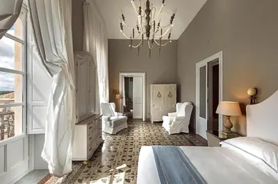 Letto o letti in una camera di Seven Rooms Villadorata