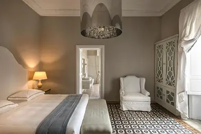 Letto o letti in una camera di Seven Rooms Villadorata
