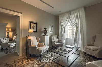 Area soggiorno di Seven Rooms Villadorata