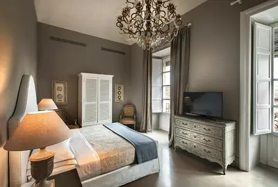 Letto o letti in una camera di Seven Rooms Villadorata