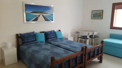 Letto o letti in una camera di Villa Sogno sulla Spiaggia