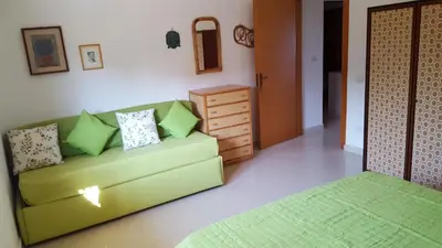 Letto o letti in una camera di Villa Sogno sulla Spiaggia