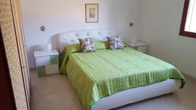 Letto o letti in una camera di Villa Sogno sulla Spiaggia
