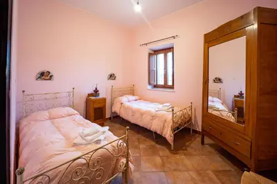 Letto o letti in una camera di Casale Della Contea